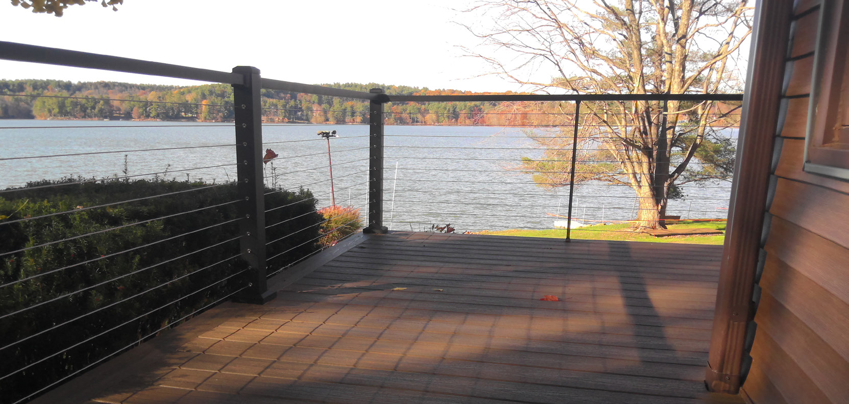Horizontal cable railing overlooking a lake